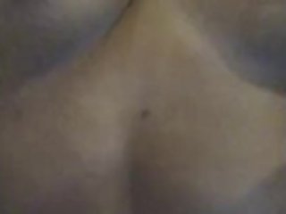 Ebony teen rubs and spits on dark nipples while slapping them